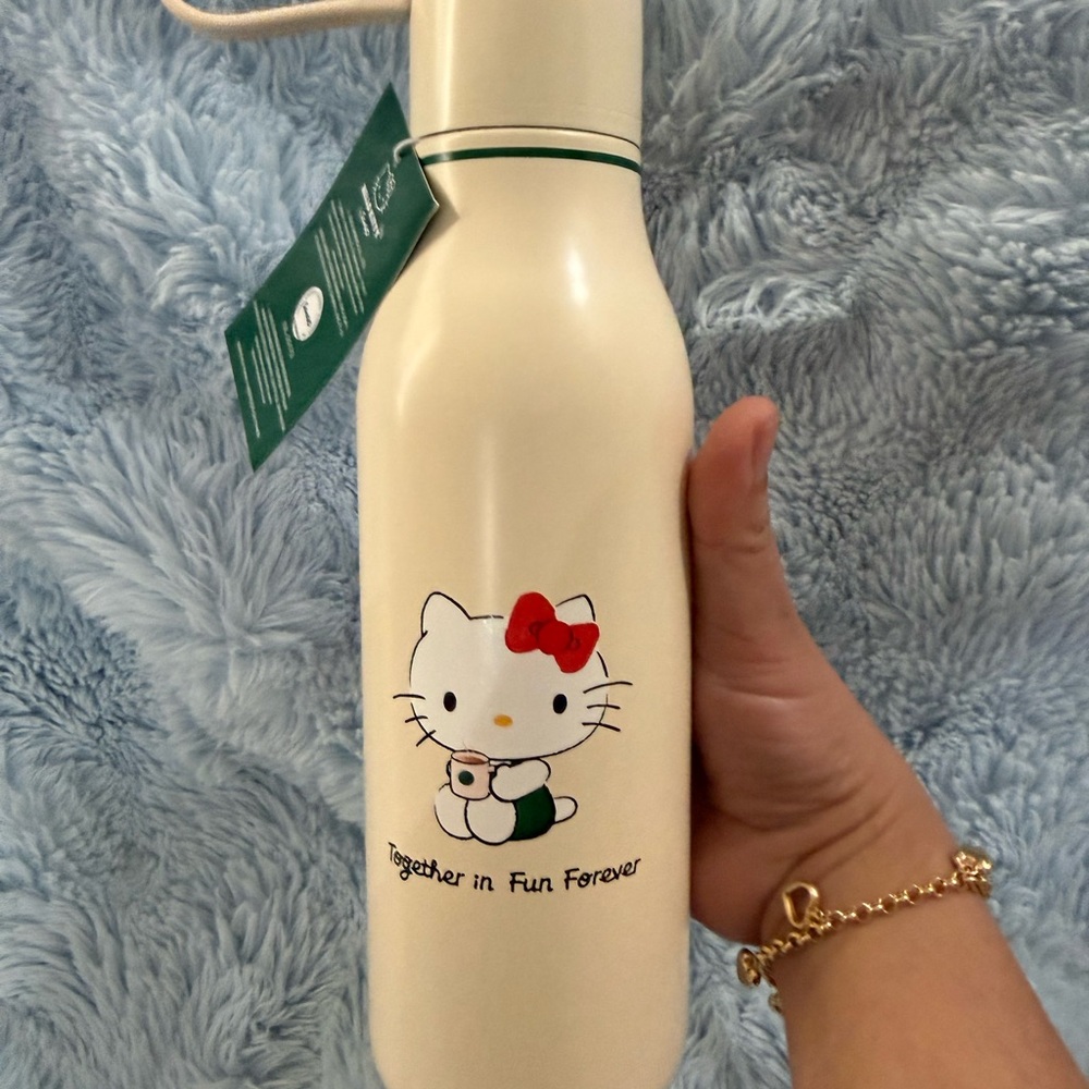 Starbucks Cream Bottle with Hello Kitty and Red Bow